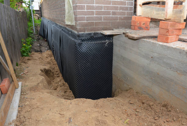 SJ Waterproofing Pros technician performing targeted Waterproofing assessment in Tullahoma, TN